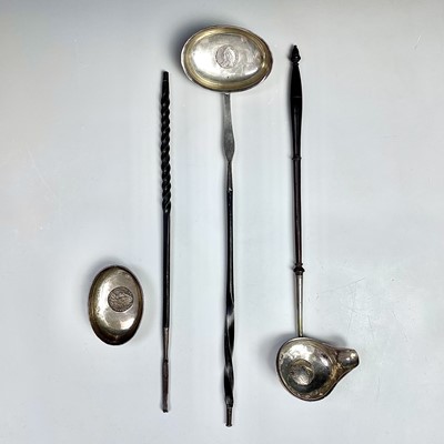 Lot 131 - Three Georgian silver toddy ladles with baleen...