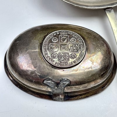 Lot 131 - Three Georgian silver toddy ladles with baleen...