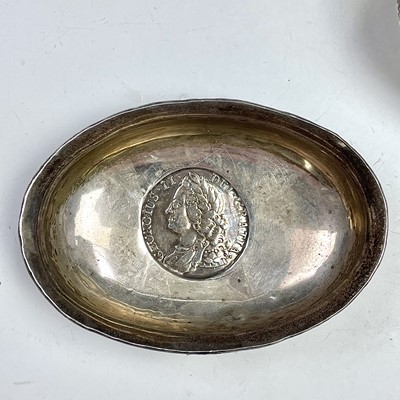 Lot 131 - Three Georgian silver toddy ladles with baleen...