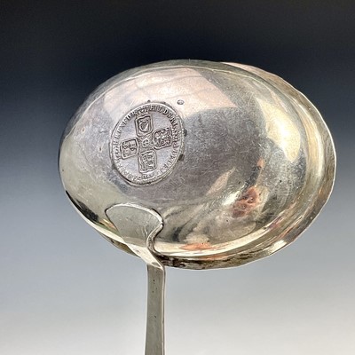 Lot 131 - Three Georgian silver toddy ladles with baleen...