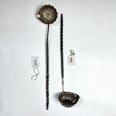 Lot 132 - Two similar Georgian silver toddy ladles with...