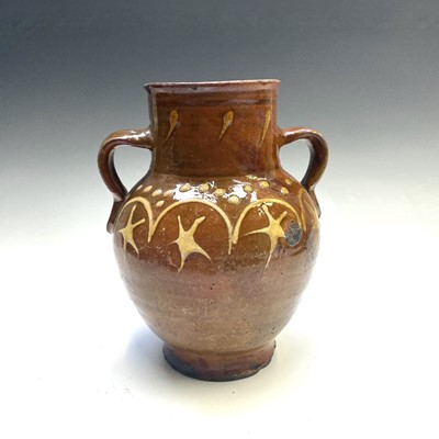 Lot 50 - An English slipware decorated vase, circa 1800,...