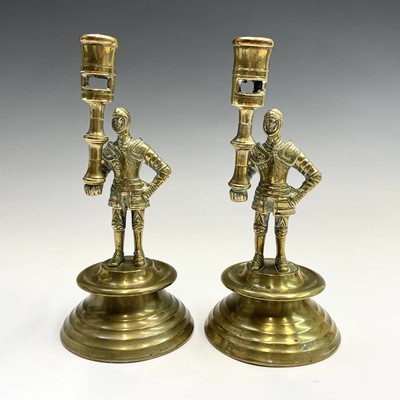 Lot 156 - A pair of brass figural candlesticks, 19th...