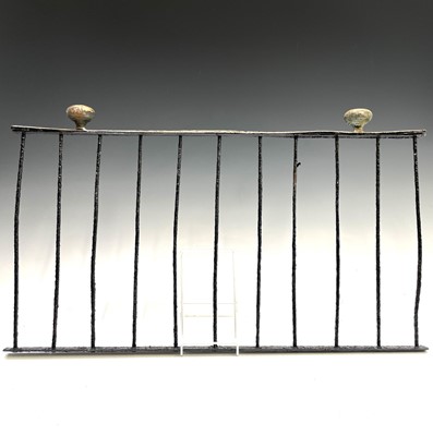 Lot 288 - A Cornish wrought iron range rack, the brass...