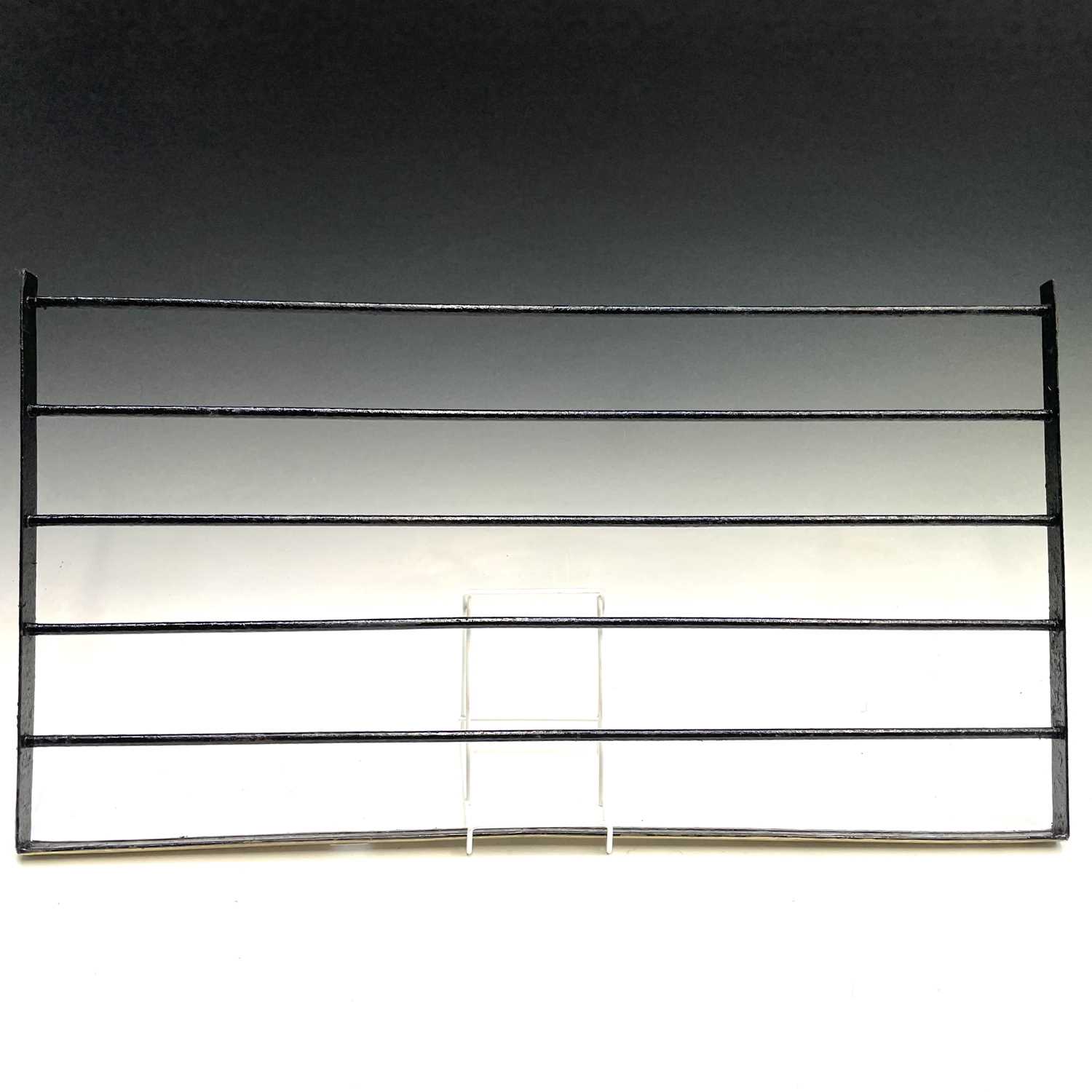 Lot 289 - A Cornish wrought iron range rack, with brass...