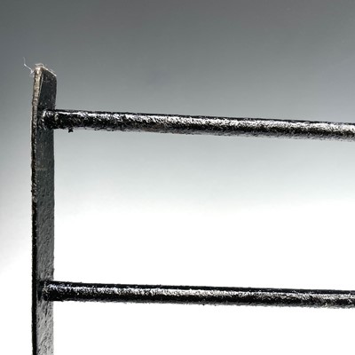 Lot 289 - A Cornish wrought iron range rack, with brass...