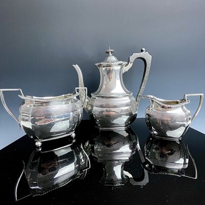 Lot 104 - A Victorian silver three piece part tea set by...