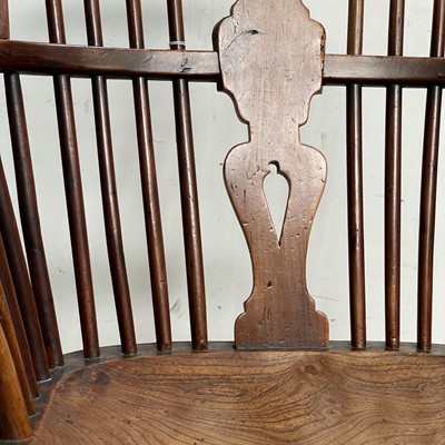 Lot 70 - A yew wood and elm Windsor elbow chair, circa...