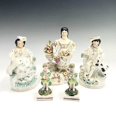 Lot 914 - A pair of Staffordshire Pearlware figures of...