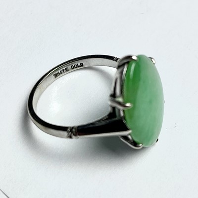 Lot 639 - An Art Deco white gold jade set ring, the...