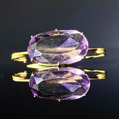 Lot 716 - A high purity gold amethyst set brooch, the...