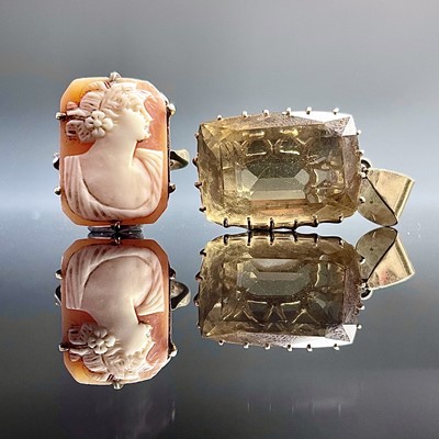 Lot 860 - A 9ct gold cameo ring; together with a gold...