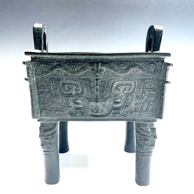 Lot 218 - A Chinese bronze archiac-style fang ding, 20th...