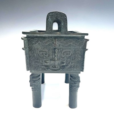 Lot 218 - A Chinese bronze archiac-style fang ding, 20th...