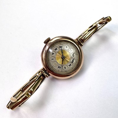 Lot 983 - An early 20th century 9ct rose gold manual...