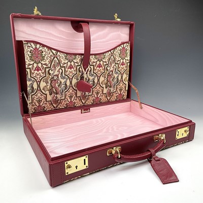 Lot 996 - A Harrods red leather briefcase with tapesty...