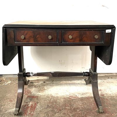 Lot 3101 - A Georgian mahogany sofa table with twin...