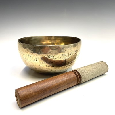 Lot 226 - A Tibetan bronze singing bowl, height 7cm,...