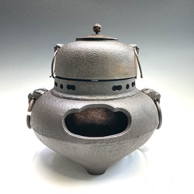 Lot 233 - A Japanese cast iron furo and chagama,...