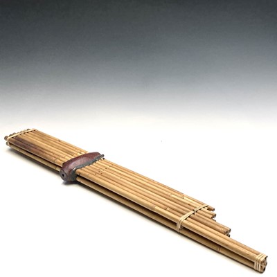 Lot 238 - A Chinese bamboo and hardwood harmonica,...