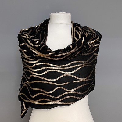 Lot 992 - A black silk and gold sequin evening scarf,...