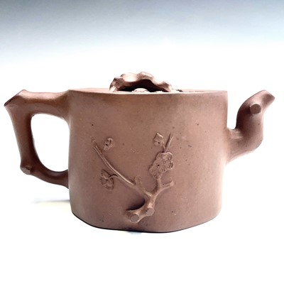 Lot 240 - A Chinese Yixing teapot, height 10cm, width 19cm.