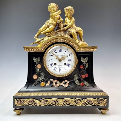 Lot 2911 - A French Empire ormolu mantel clock, the dial...