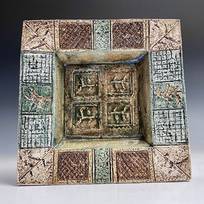 Lot 1043 - A Troika pottery square dish, decorated by...