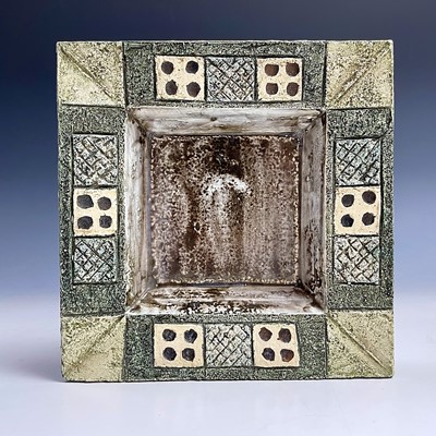 Lot 1044 - A Troika pottery square dish, decorated by...