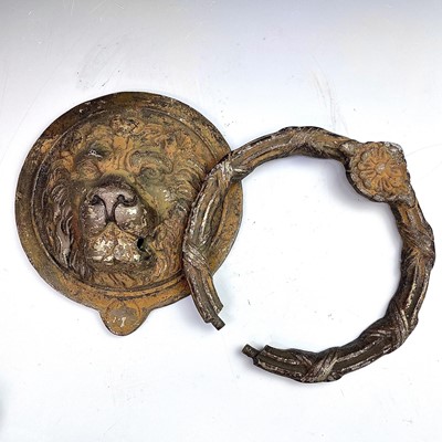 Lot 300 - A substantial brass door knocker, 20th century,...