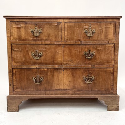 Lot 1839 - A walnut and crossbanded chest of two short...