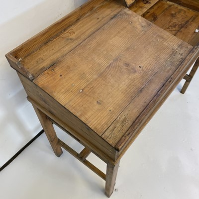 Lot 3117 - A pine clerk's desk, with two sloping lift-up...