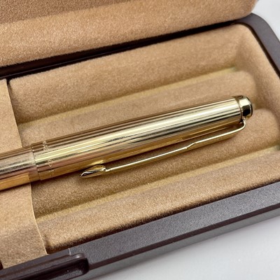 Lot 215 - A Parker Golden Falcon gold plated ball point...