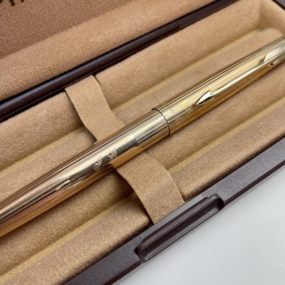 Lot 215 - A Parker Golden Falcon gold plated ball point...
