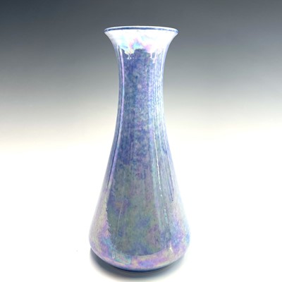 Lot 853 - A Ruskin pottery blue lustre bottle vase...