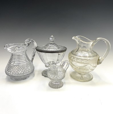 Lot 943 - A Georgian cut glass jug, with stepped and...