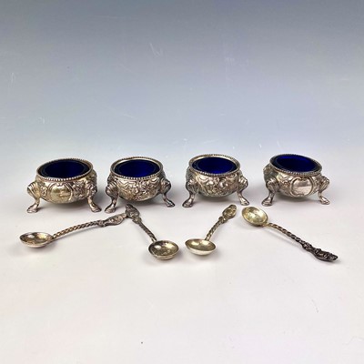 Lot 114 - A Victorian silver set of four salts and salt...