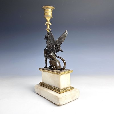 Lot 8 - A French bronze and ormolu candlestick, late...