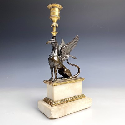 Lot 8 - A French bronze and ormolu candlestick, late...