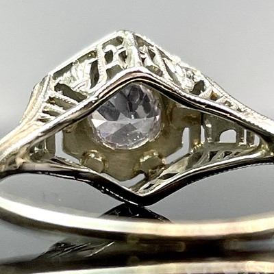 Lot 680 - An18ct white gold white stone set ring,...