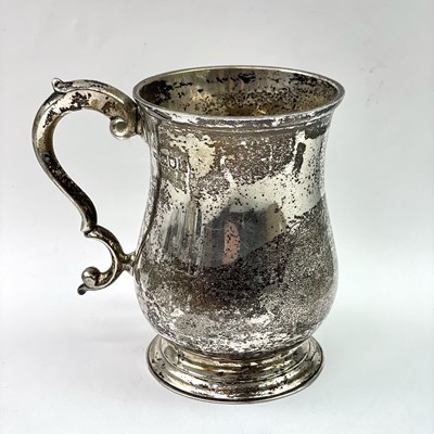 Lot 125 - An Edwardian silver baluster Christening mug...