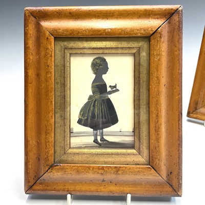 Lot 32 - An early 19th century silhouette, of a young...