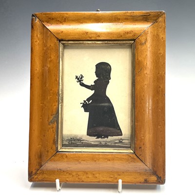 Lot 32 - An early 19th century silhouette, of a young...