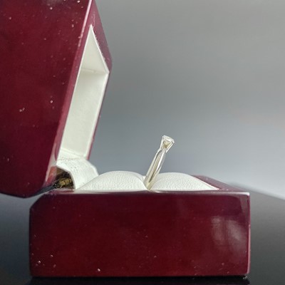 Lot 62 - A 14ct white gold certified diamond solitaire...