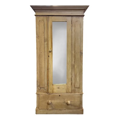 Lot 3125 - A pine single wardrobe, with a mirror door and...