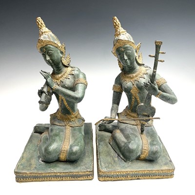 Lot 251 - Two Thai gilt and painted bronze figures of...