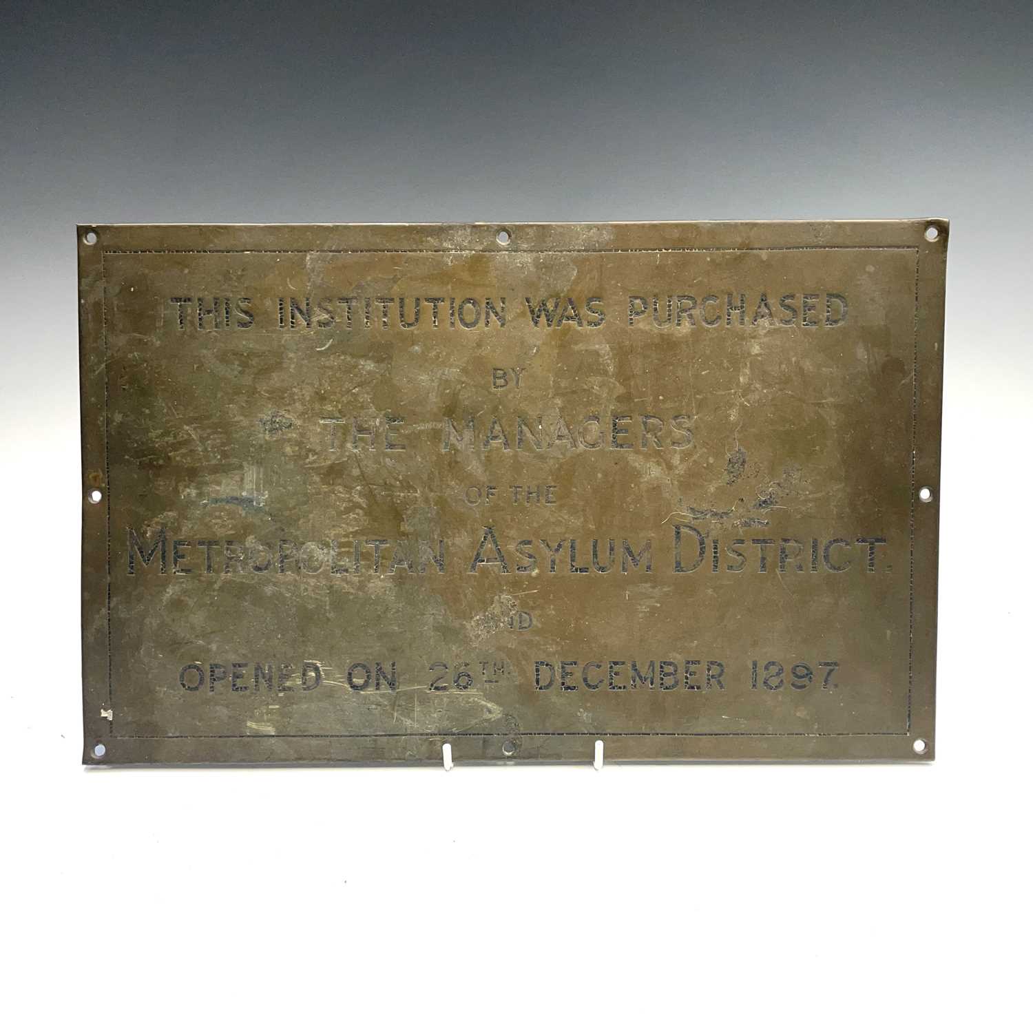 Lot 214 - A Victorian brass plaque, inscribed 'This...