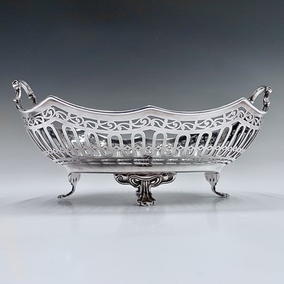 Lot 140 - A George V silver basket by Harry Atkin, of...