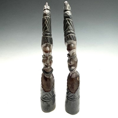 Lot 140 - A pair of central African heavy hardwood...
