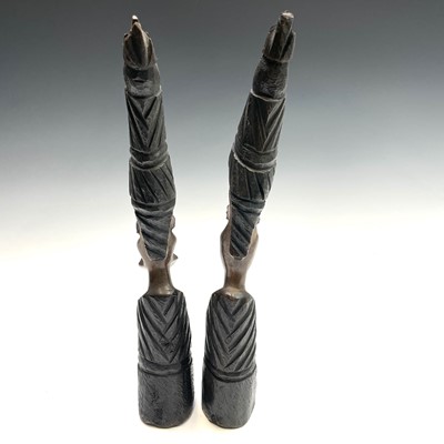 Lot 140 - A pair of central African heavy hardwood...